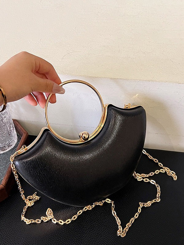BOLSO DE MANO DORADO METÁLICO CON ASA CIRCULAR