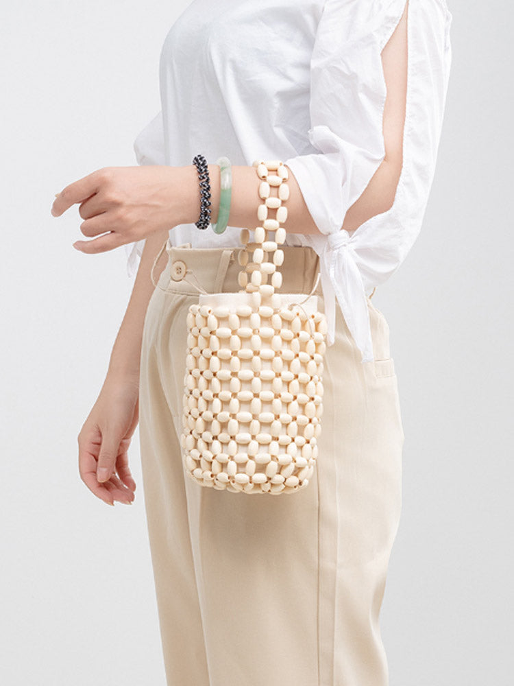 BOLSO VERANIEGO DE MADERA AHUECADO SOFISTICADO